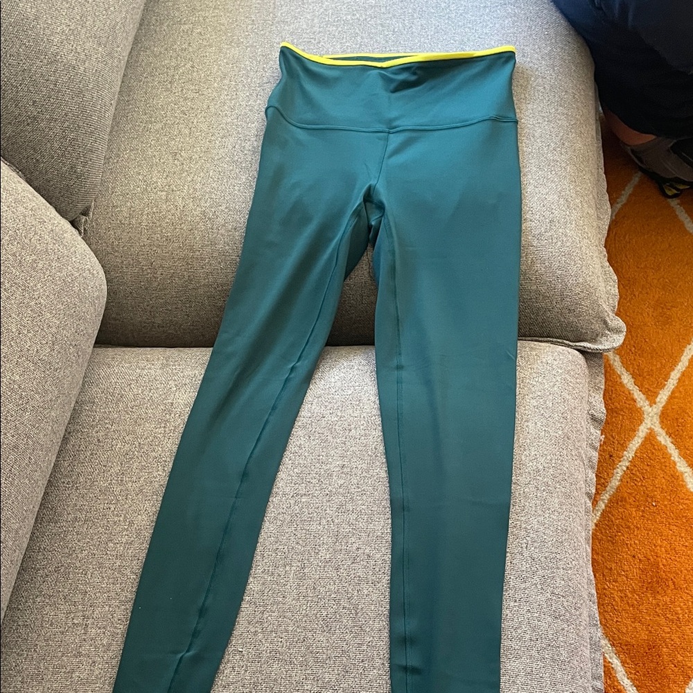 Cotopaxi Green Leggings with Yellow Trim